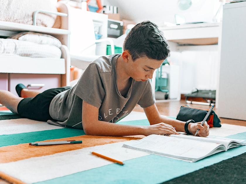 Person Rushing His Homework 7 reasons kids with ADHD often rush through homework